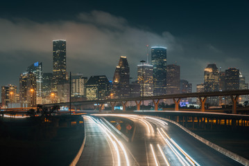 Obraz na płótnie Canvas Cityscape photo of the Houston skyline at night, in Houston, Texas