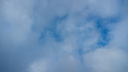 dark blue sky with white clouds