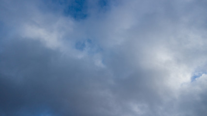 dark blue sky with white clouds