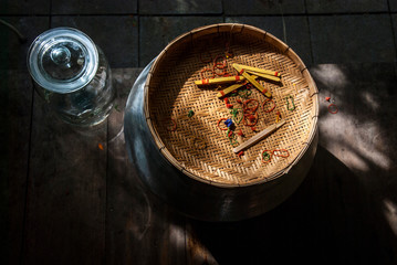 Glass jar and woven baskets in thaihouses.