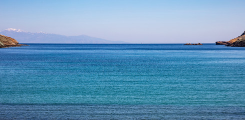 Greece. Aegean sea. Blue sky and calm sea water texture background