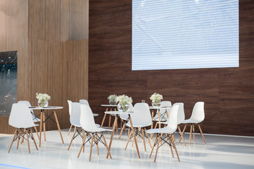 White chair and white flowers