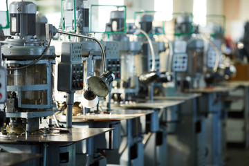 Industrial background of metal machine units in row, copy space