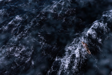 concept art of fishing boat on stormy open ocean 