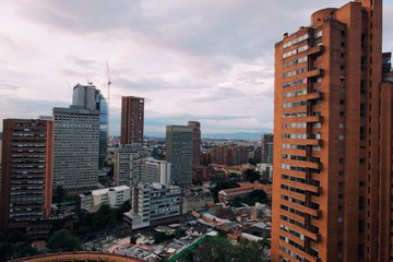 Obraz premium Skyscrapers and cloudy sky in Bogota, colombia
