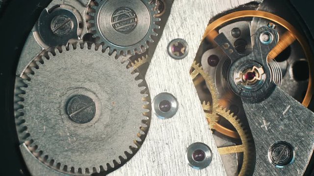 Opened hand watches moving mechanism macro Extreme close-up. Slow Motion Time runs concept footage