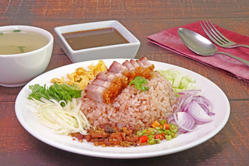 Fried rice with shrimp paste (Khao khluk Kapi) is a flavorful dish in Thai cuisine that consists of primary ingredients of fried rice mixed with shrimp paste (Kapi),  typically served as a lunch dish.