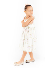 Cute girl in several poses on studio 