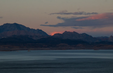 Naklejka na ściany i meble Sunset at Lake Mead National Recreation Area with River Mountains in background
