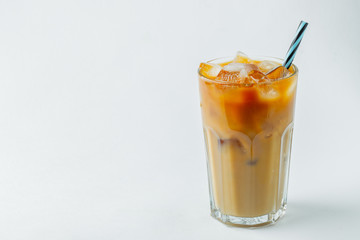 glass of cold coffee on white background.