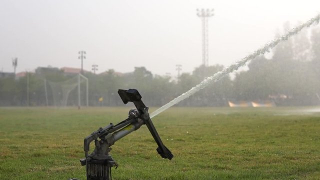 Water springer on football field