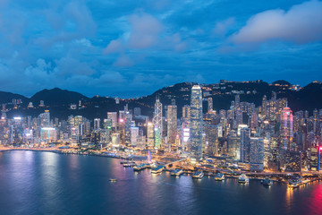 Fototapeta na wymiar Aerial view of Victoria Harbor of Hong Kong City at dusk