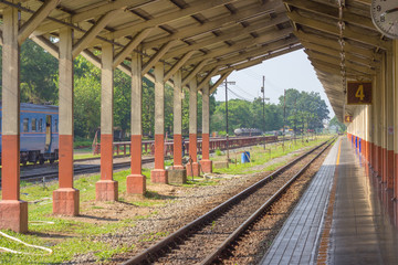Fototapeta na wymiar Train station and railroad tracks in the morning at Chiang mai, Thailand.
