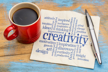 creativity concept - word cloud on napkin
