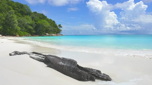 Static Low Angle Shot Of Waves Gently Rolling Onto An Empty Beach On The Similan Islands, Thailand