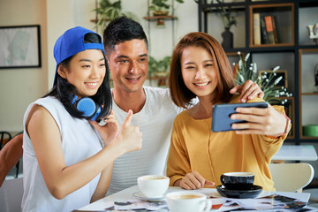 Young people posing for selfie