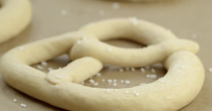 Slow tilt up, macro shot of frozen Pretzel.
