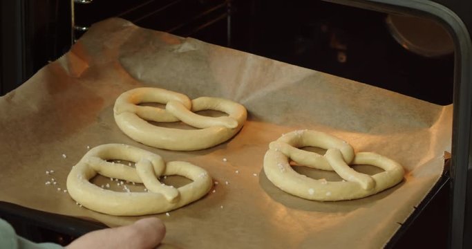 Homemade Pretzels being put in the oven.