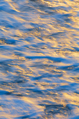 Backlit water in motion