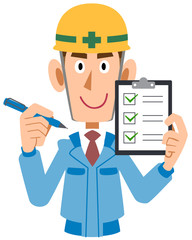 チェックリストを手に持つ建築作業員の男性