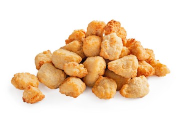 Fried chicken pieces on white background
