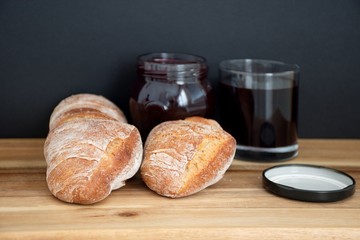 Blueberry food and drink on the wooden table against the black background