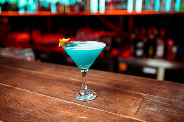 Blue Curacao alcohol cocktail on glass