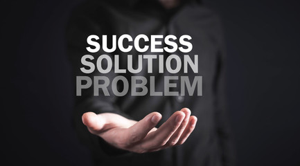 Man holding words. Problem, Solution, Success
