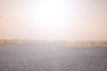 Fototapeta premium Fabulous sunset over the river. Spring evening landscape.