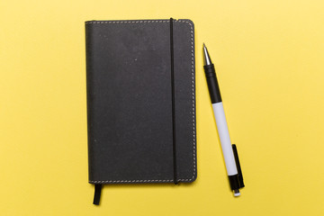 school notebook on a yellow background