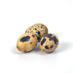 Fresh Quail eggs on background.Food and health concept.