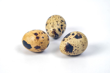 Obraz premium Fresh Quail eggs on background.Food and health concept.