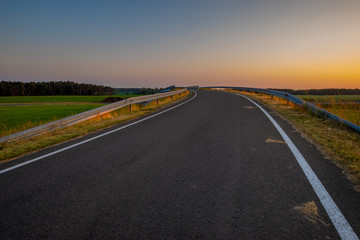 road on the viaduct above the highway
