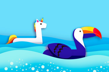 Giant inflatable Fantasy Unicorn and Toucan paper cut style. Origami Pool float toys. Crystal clear blue sea water. Summer holidays. Sunny days.