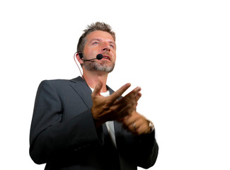 confident successful man with headset speaking at corporate business coaching and training...