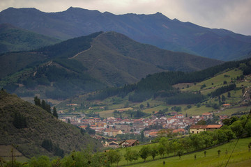 Fototapeta premium Spanish village in avalley surounded with mountains