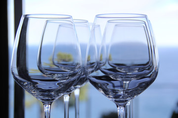 Wine glasses by the sea
