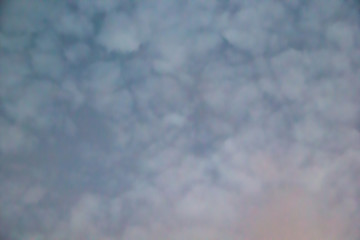 Soft blurry clouds in pink and blue