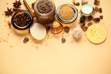 Sugar scrubs with ingredients on color background