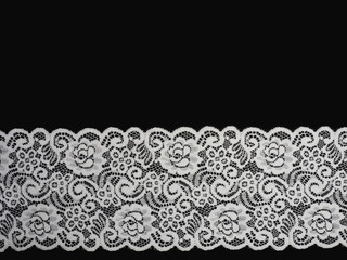 White wide lace on a black background