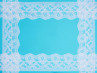White lace on a blue background