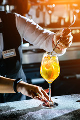 Colorful cocktail on top of the bar in Italian restaurant.