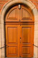 Wooden door in a stone frame