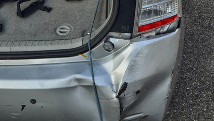 A Toyota Prius in metallic gray was damaged.