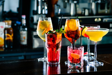 Selection of cocktails martini spritz in bar blurred background