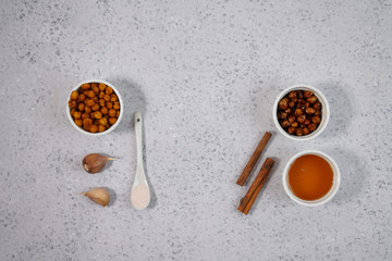 roasted chickpeas in different flavors on a black background. the toning. selective focus