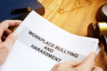 Workplace bullying and harassment claim in a court. - obrazy, fototapety, plakaty
