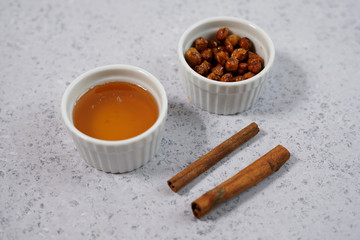 roasted honey cinnamon chickpeas on a black background. the toning. selective focus