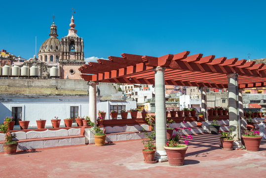 A view of the cathedral from a top roof pegola in the beautiful and colonial city of Guanajuato. MEXICO