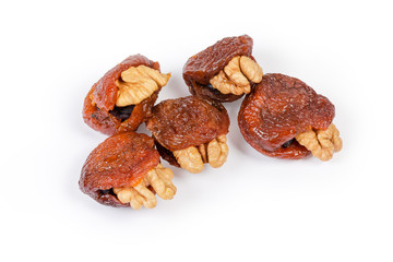 Dried apricots stuffed with walnuts and raisins close-up